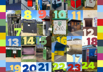 24 bunte Fußballhäuschen als Adventskalender. Alle Häuschen von 1-24 sind nebeneinander aufgereiht. Die Häuschen haben jeweils das Logo von Trauer und Fußball, die Fußballblume irgendwo im Häuschen untergberacht.
